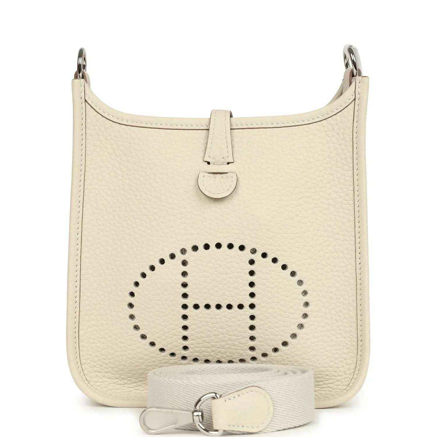 Mini leather hobo bag in light cream with perforated logo and top handle straps