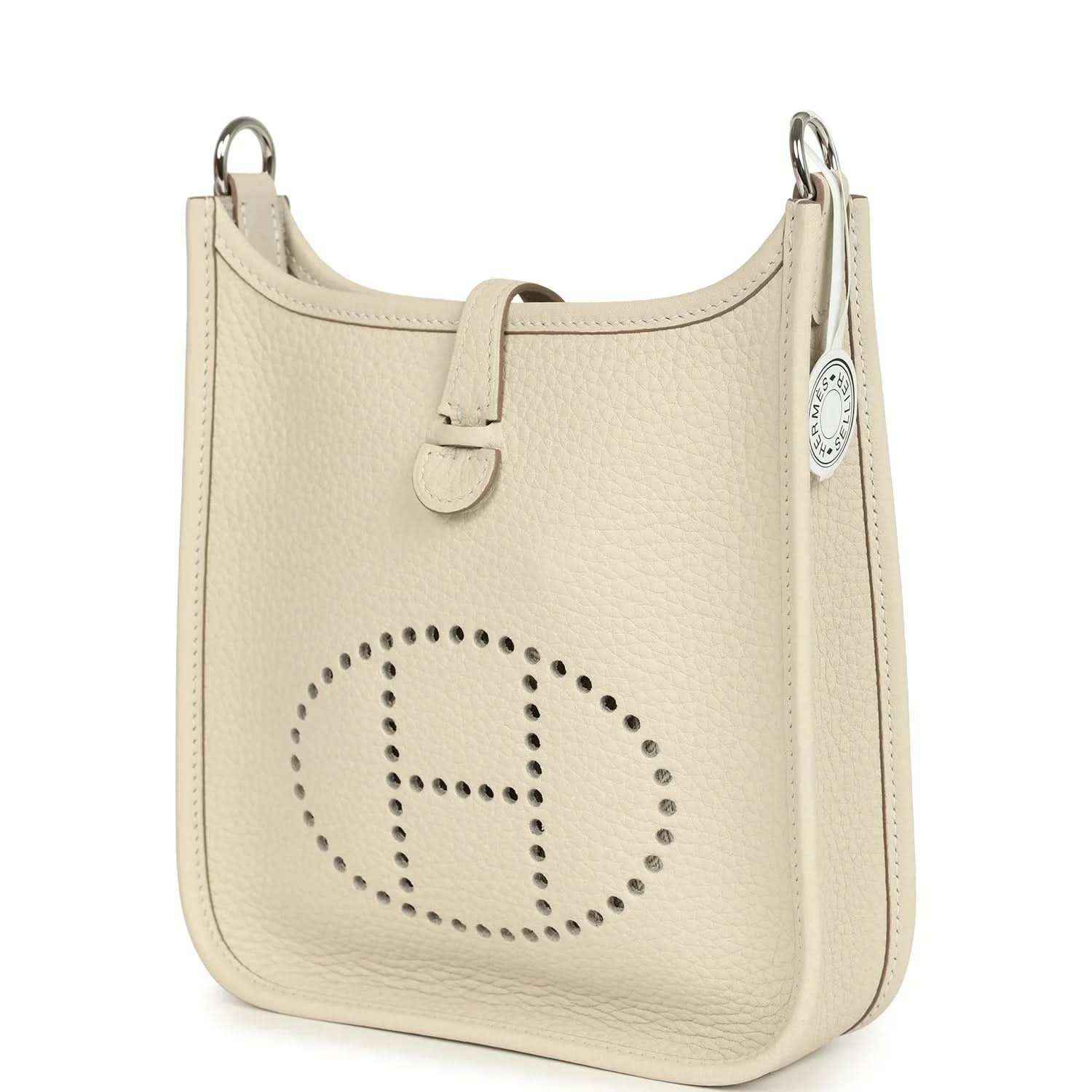 Mini leather shoulder bag in light cream with perforated logo and side panel