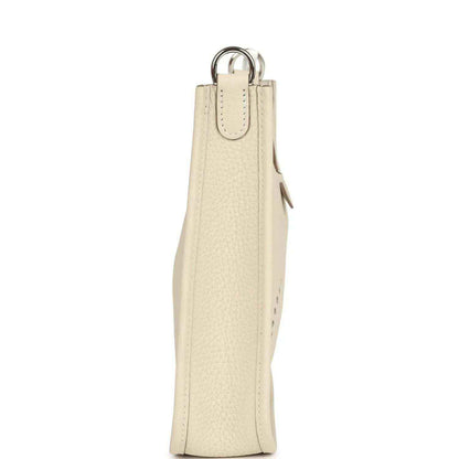 Cream leather vertical bag with top handle and side zip detail