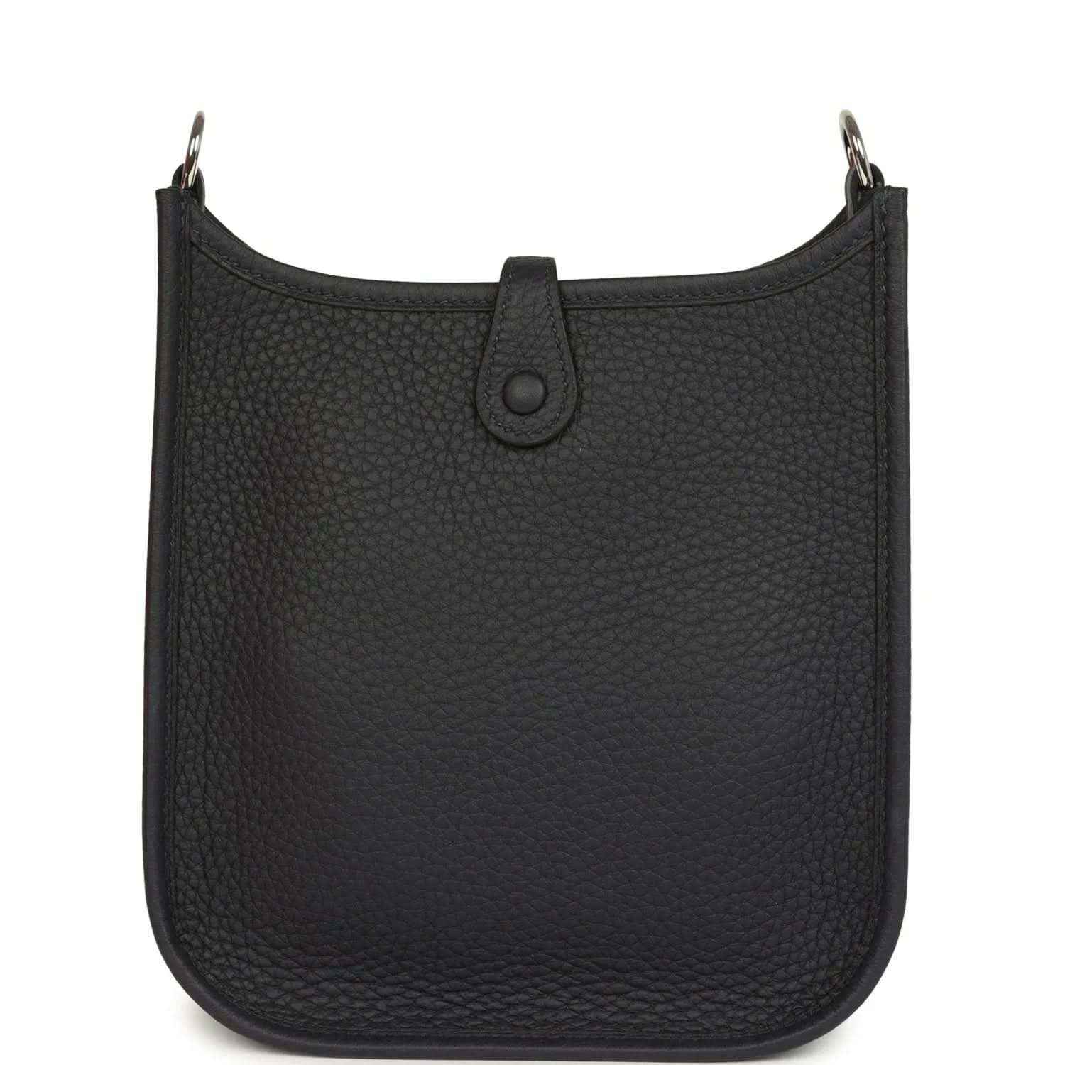 Evelyne TPM bag in dark leather with top opening and central strap tab detail