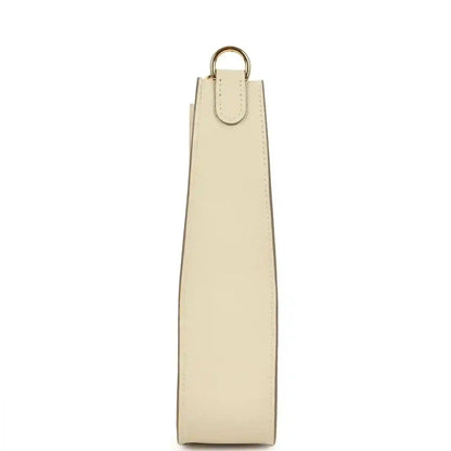 Cream leather crossbody bag strap with gold ring and stitched leather edge