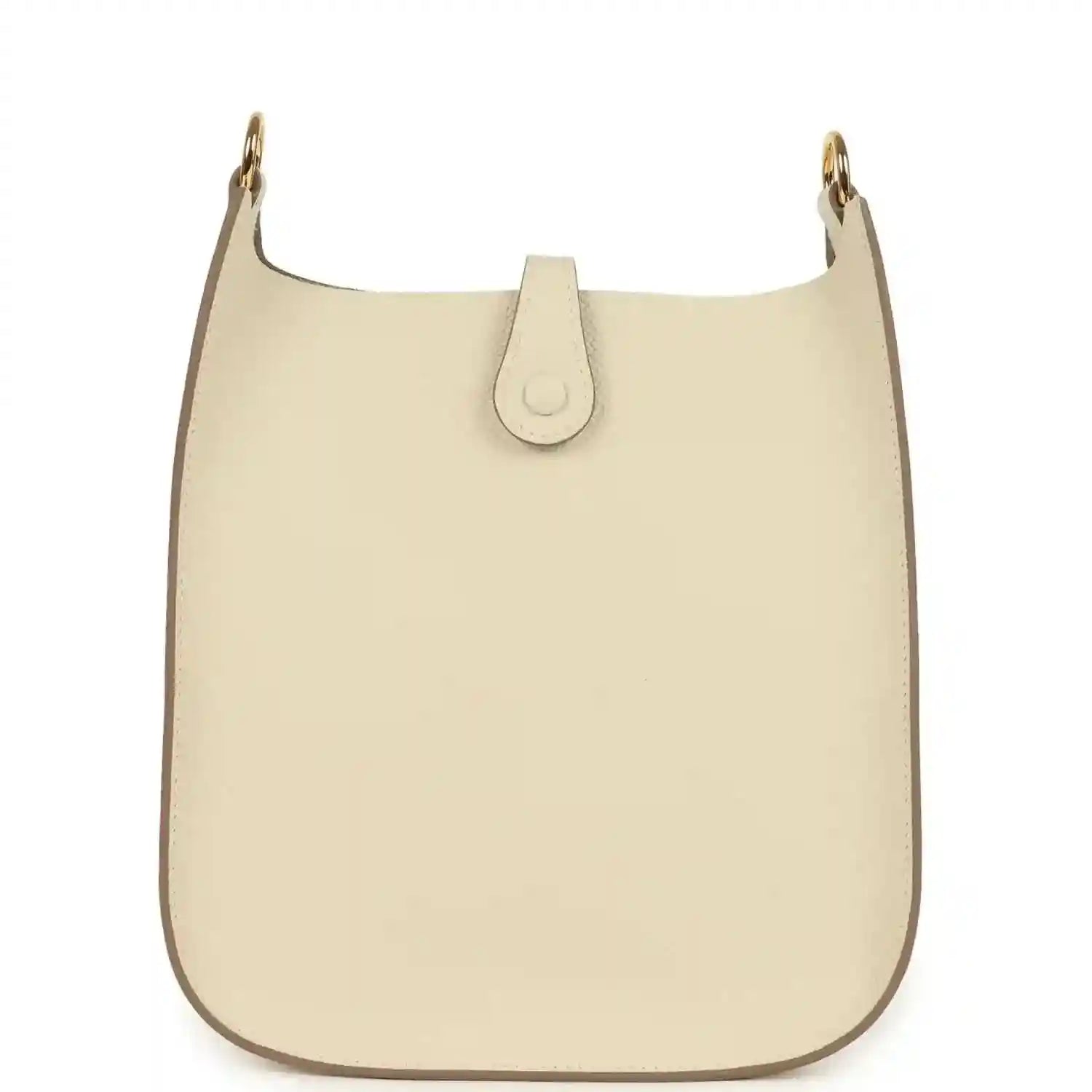 Cream leather crossbody bag front with top strap and central leather tab