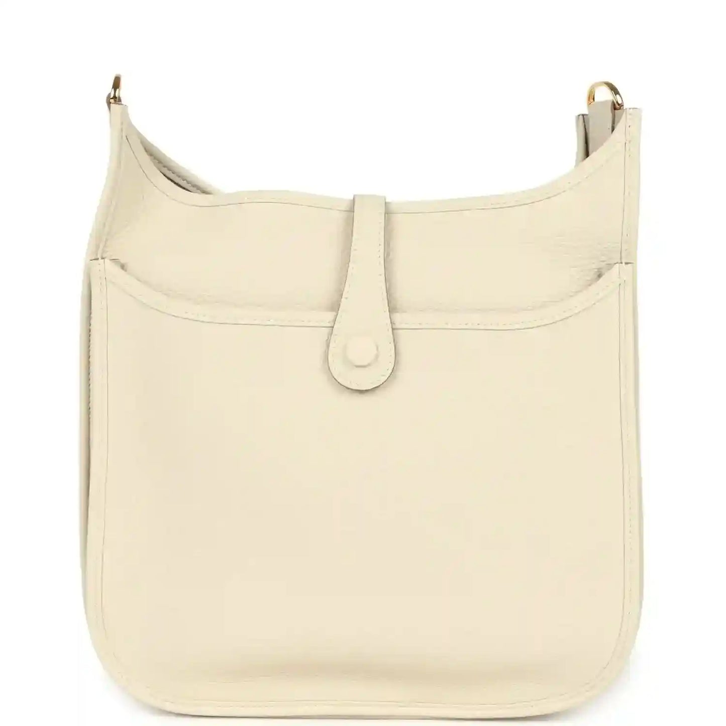 Cream leather shoulder bag with curved flap, stitched panel seams, and gold-tone top hardware.