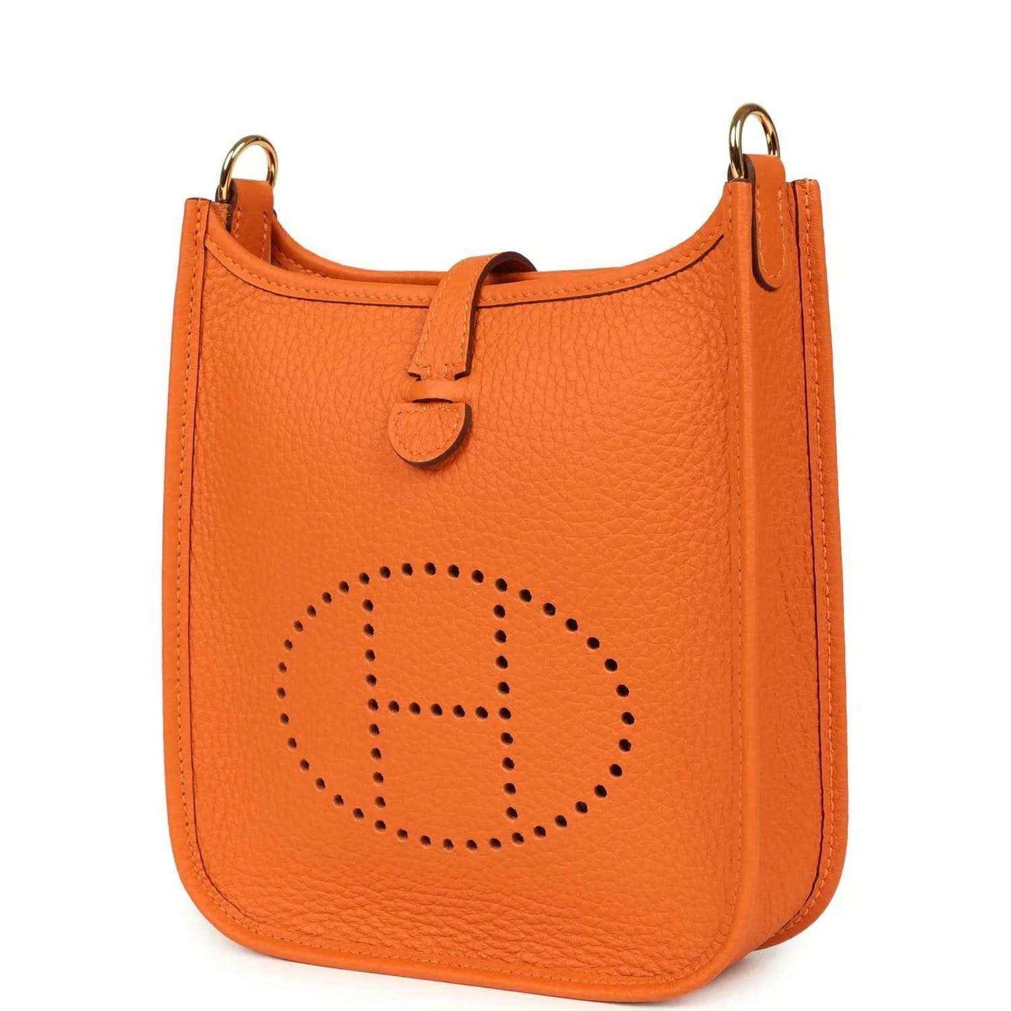 Orange Clemence leather crossbody bag with dotted Hermes logo and side zipper pull