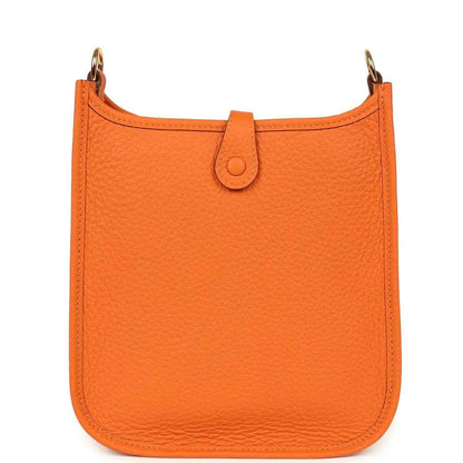 Orange Clemence leather crossbody bag front panel with top loop strap and stitching