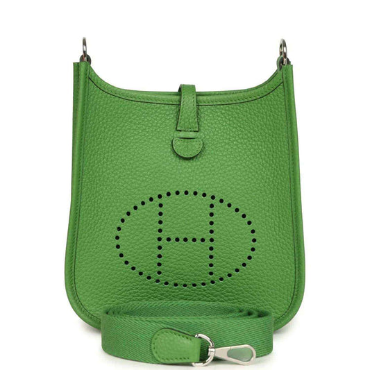 Green pebbled leather Evelyne TPM bag with perforated H logo and front strap