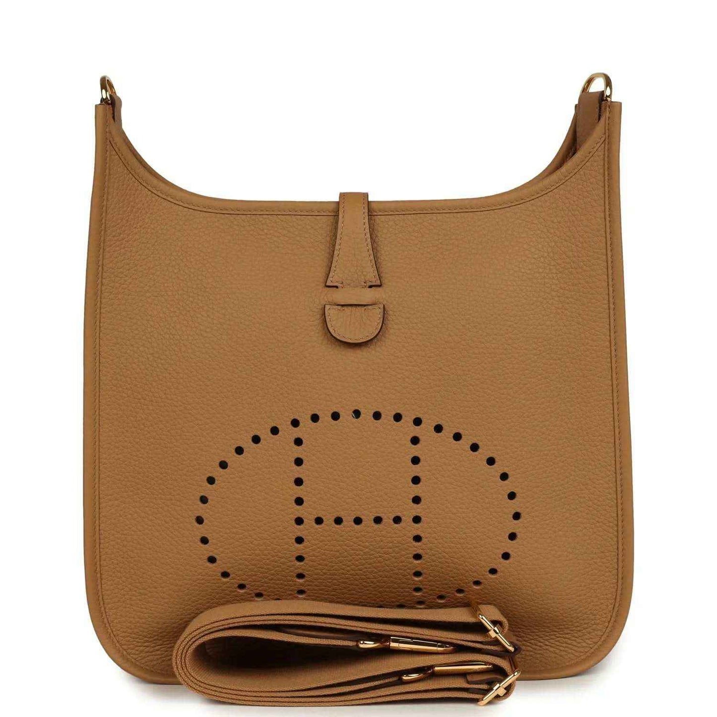 Tan leather hobo bag with perforated logo, snap tab, and gold hardware