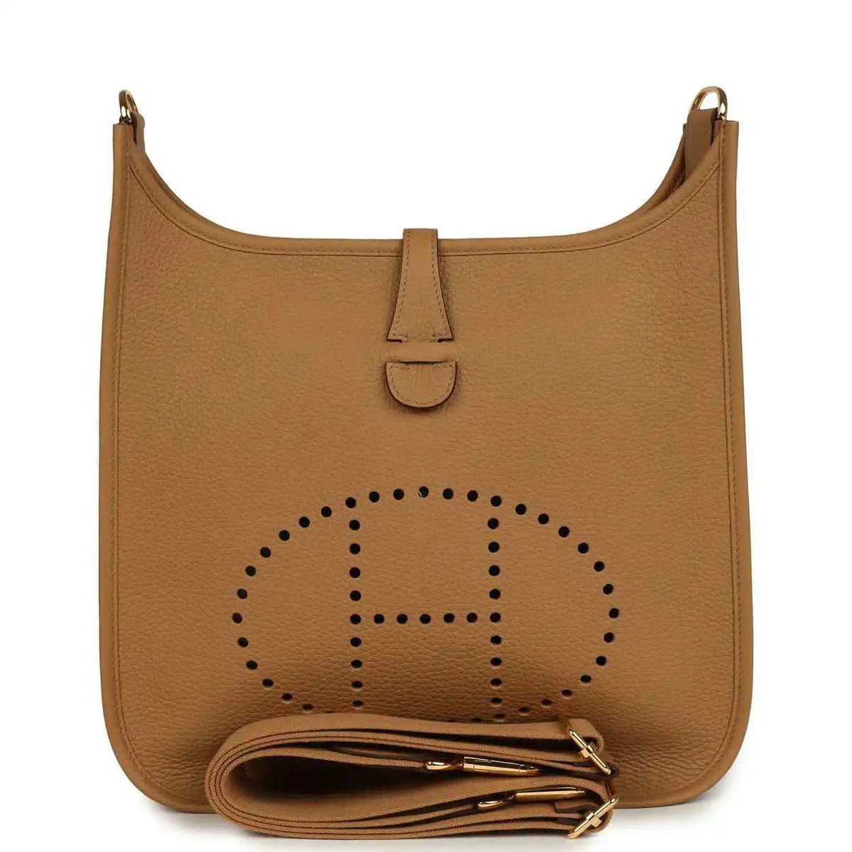 Tan leather hobo bag with perforated logo, snap tab, and gold hardware