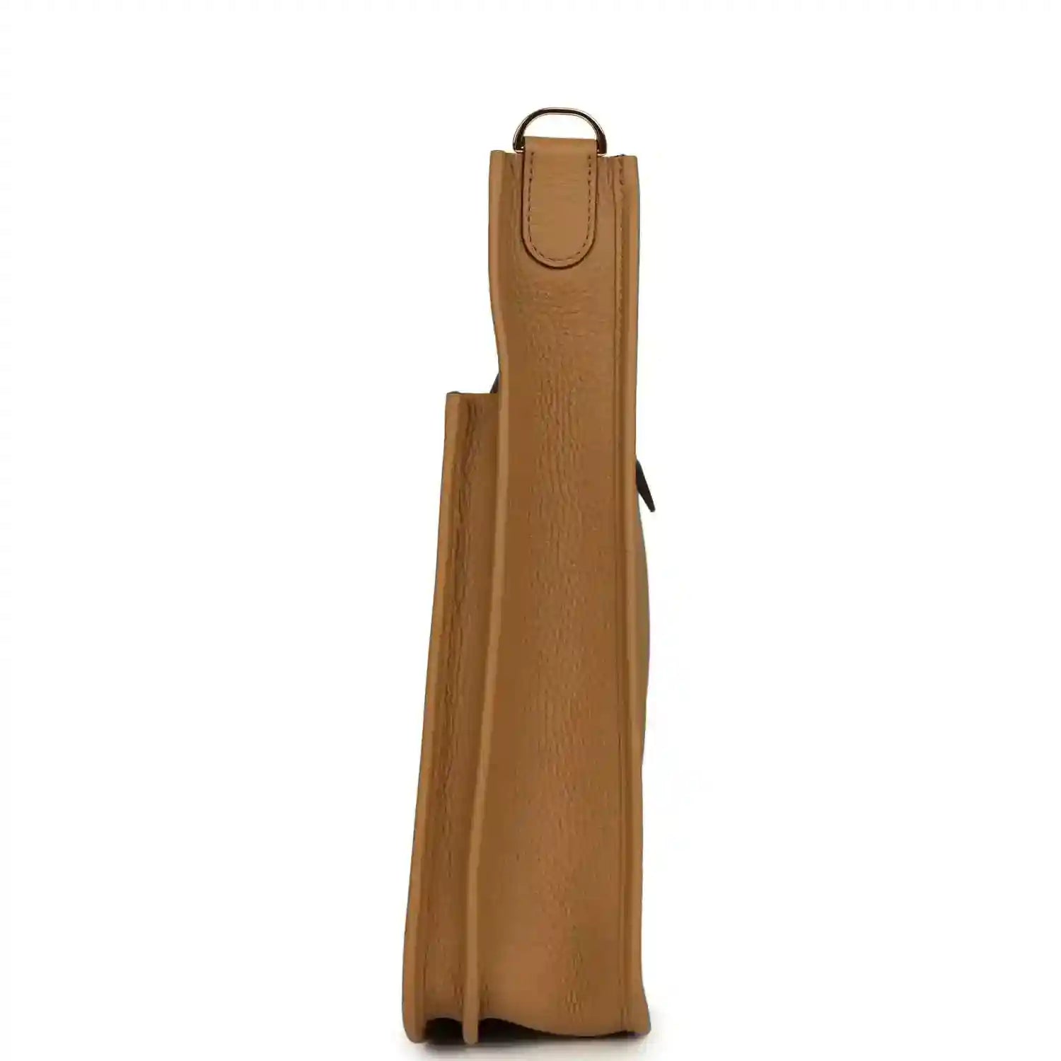 Tan leather bag side view with vertical panel and top handle loop