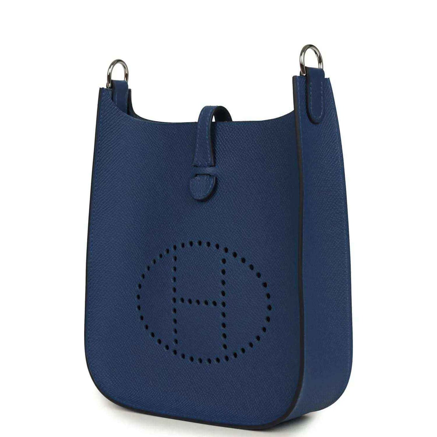 Evelyne Sellier TPM shoulder bag in blue textured leather, side view with logo