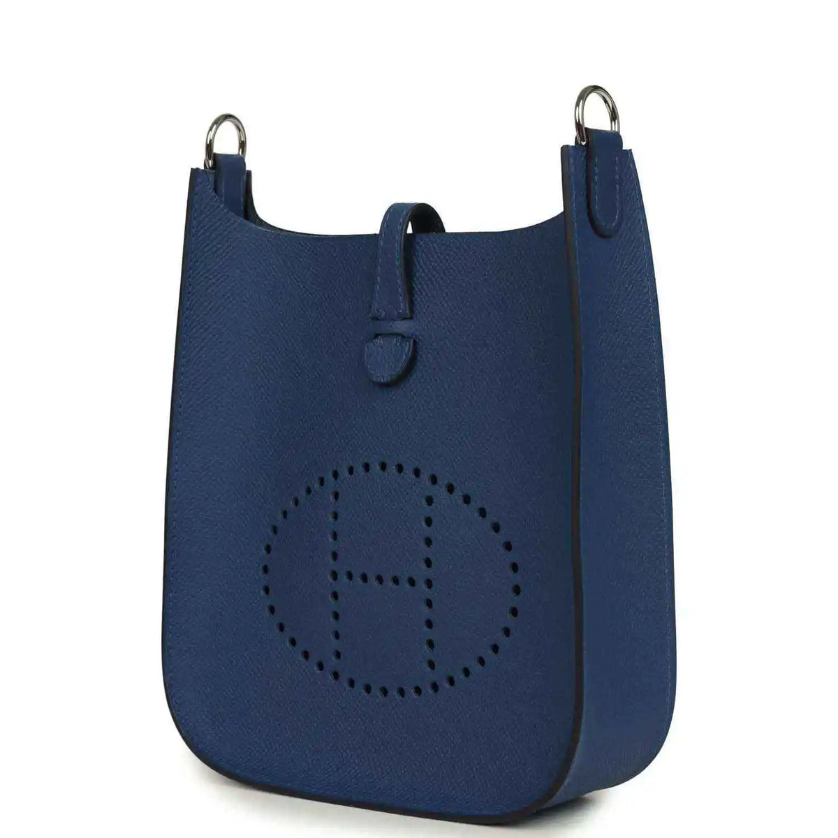Evelyne Sellier TPM shoulder bag in blue textured leather, side view with logo