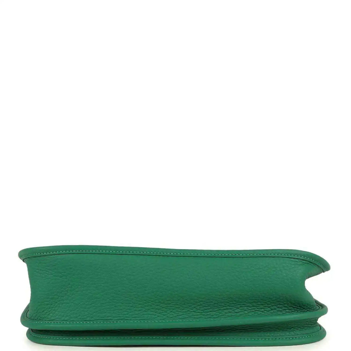 Green leather crossbody bag bottom edge view with visible side seams