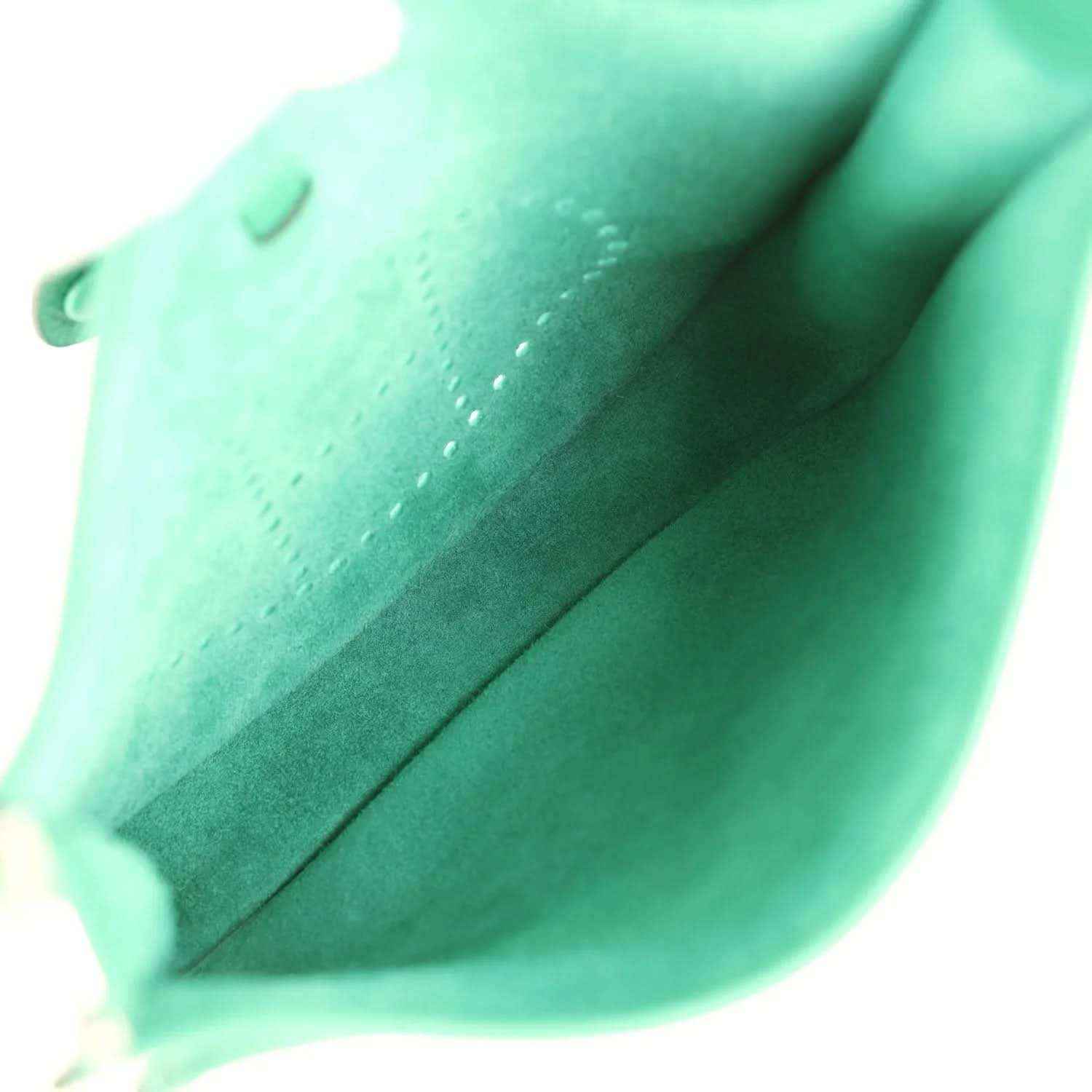 Green leather crossbody bag interior lining panel