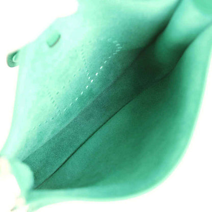 Green leather crossbody bag interior lining panel