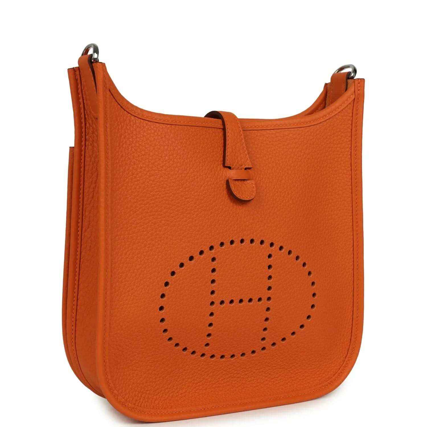 Orange leather hobo bag with perforated 'E' emblem and curved top opening
