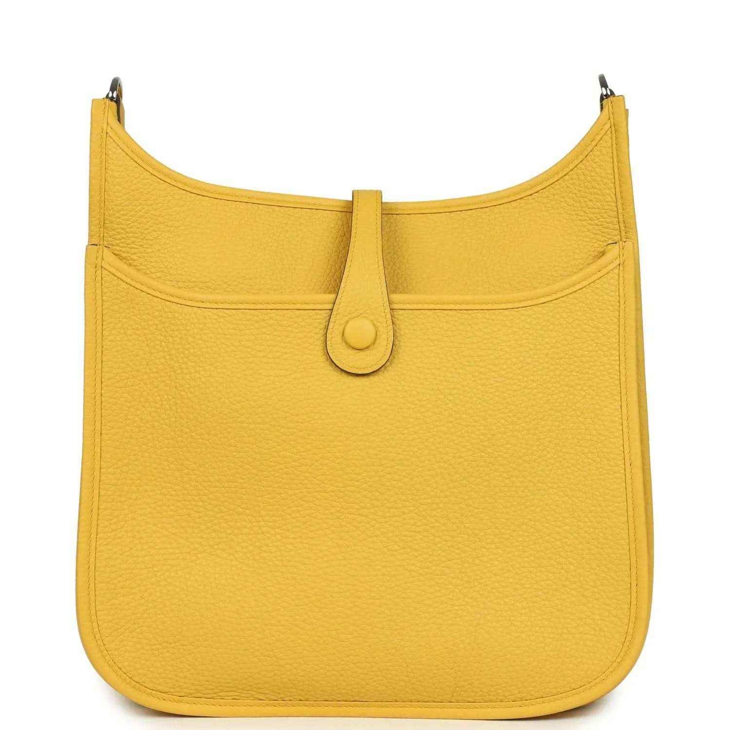 Yellow leather hobo bag with curved top, front flap, and central tab closure