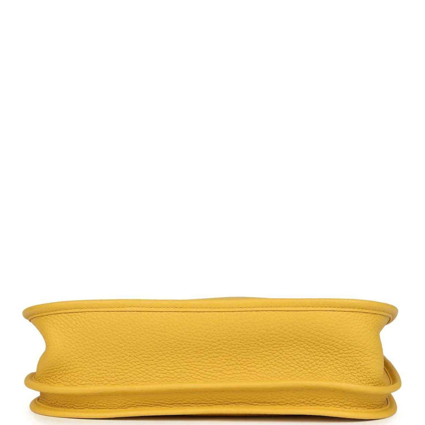 Yellow leather bag bottom view with stitched edging and rounded seam detail