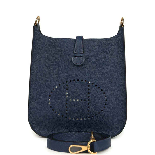 Hermes crossbody bag in blue with perforated logo and gold-tone strap clasp