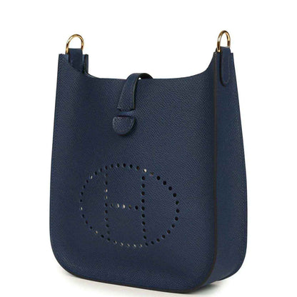 Hermes crossbody bag in blue with perforated logo and top strap detail