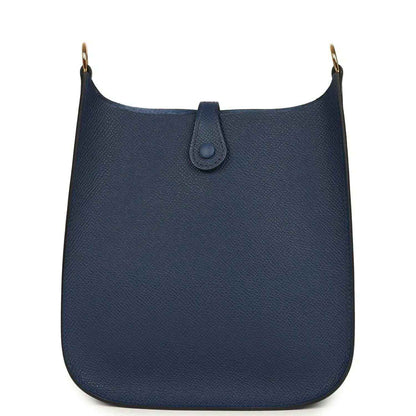 Hermes crossbody bag in blue with top closure tab and pebbled leather finish