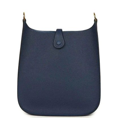 Hermes crossbody bag in blue with top closure tab and pebbled leather finish
