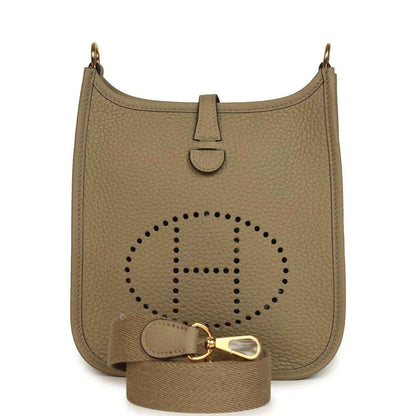 Beige pebble-grain leather Evelyne TPM bag with perforated H logo and gold hardware