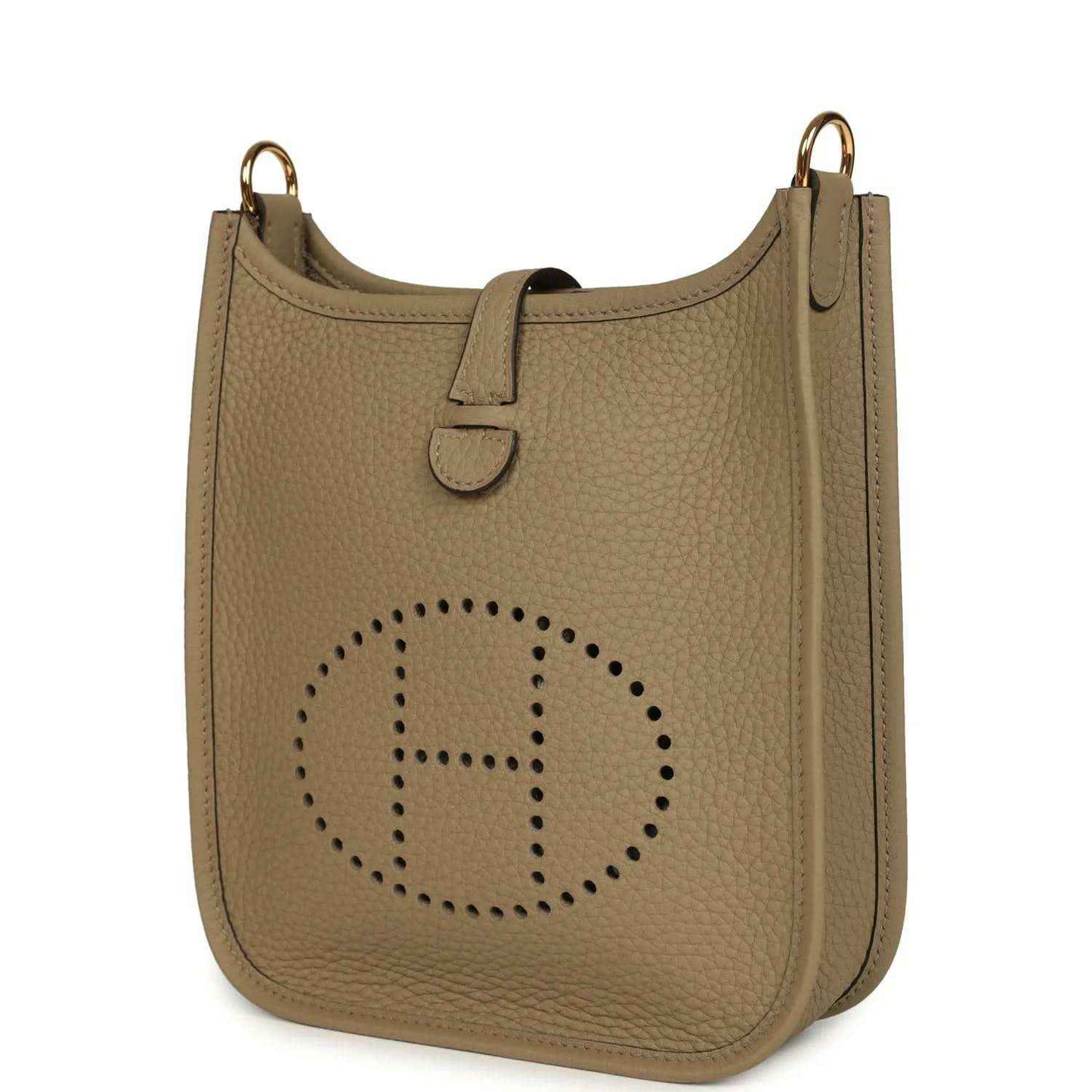 Beige pebbled leather Evelyne TPM bag angled view with perforated H logo and side panel