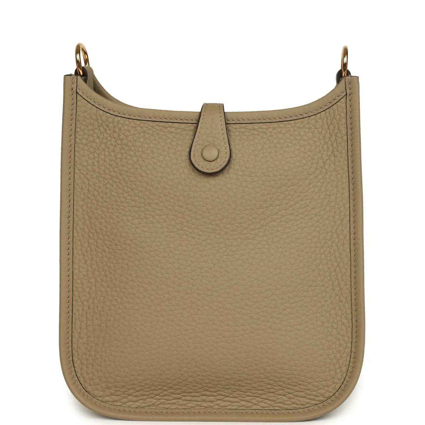 Beige pebbled leather Evelyne TPM bag front with centered loop closure tab and gold hardware