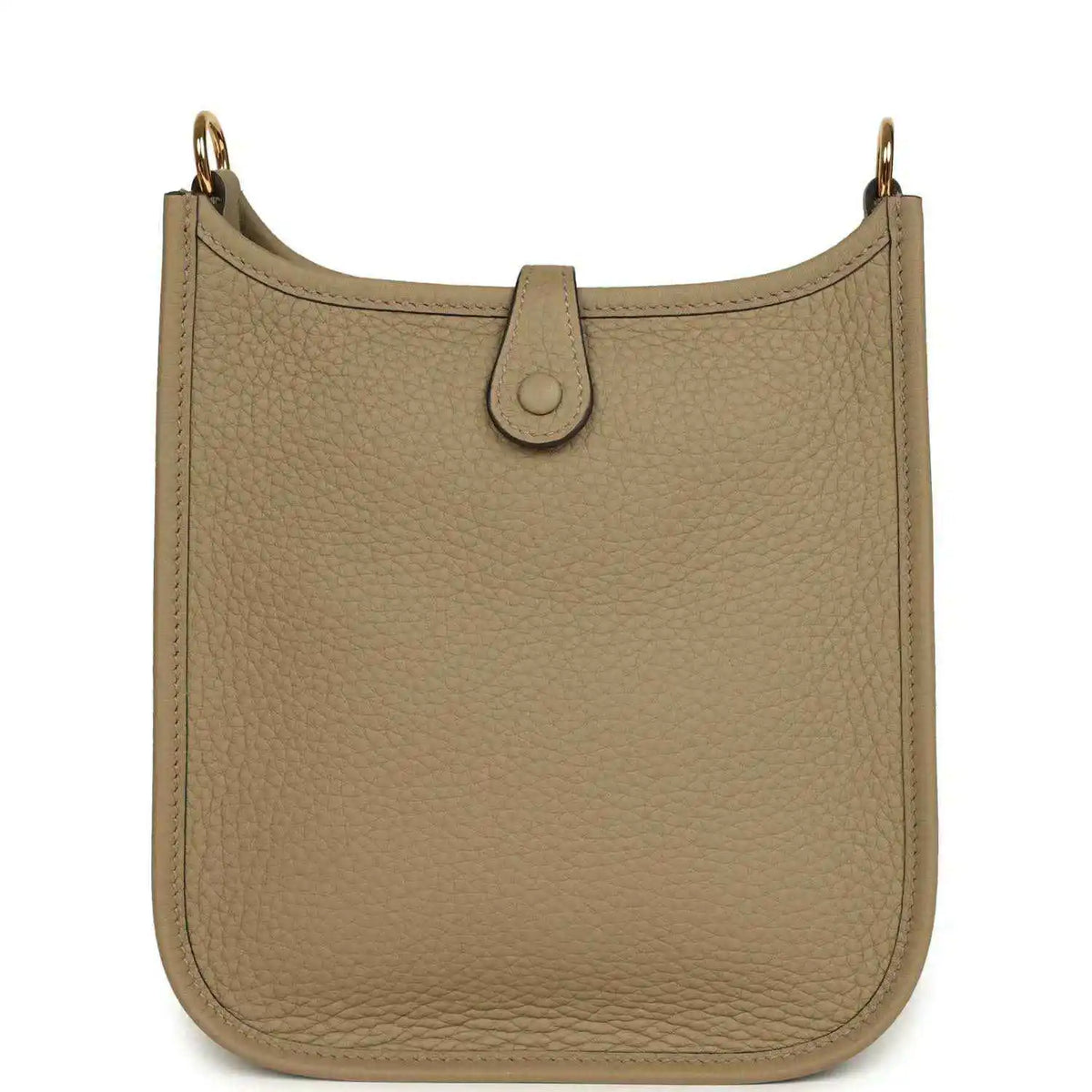 Beige pebbled leather Evelyne TPM bag front with centered loop closure tab and gold hardware