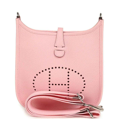 Hermes Evelyne 23 bag in rose pink leather, front dotted H logo, strap and clasp