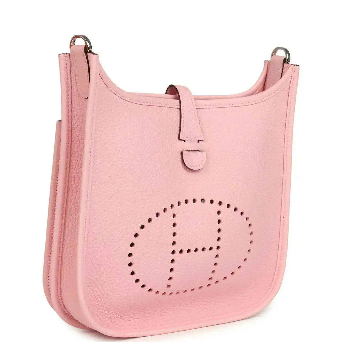 Hermes Evelyne 23 bag in rose pink leather, side view with dotted H logo and strap
