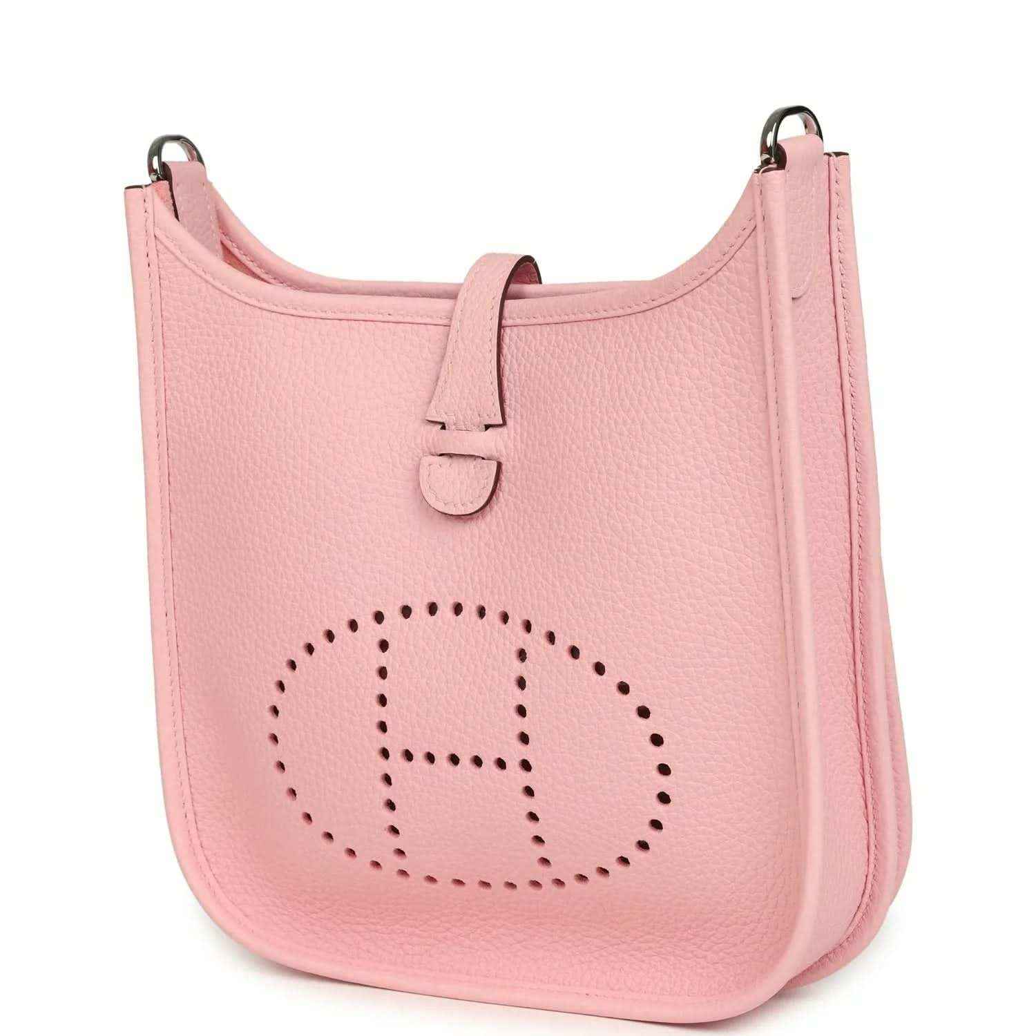 Hermes Evelyne 23 bag in rose pink leather, front view with dotted H logo and top strap