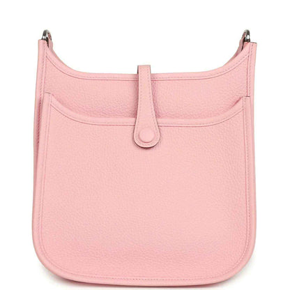 Hermes Evelyne 23 bag in rose pink leather, front view with top clasp and curved base