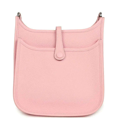 Hermes Evelyne 23 bag in rose pink leather, front view with top clasp and curved base