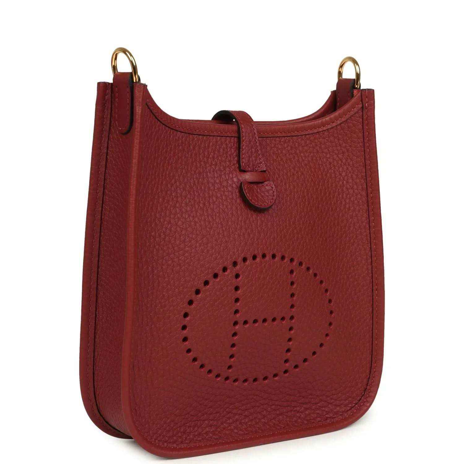 Red textured leather small crossbody bag with perforated logo and gold-tone handle rings