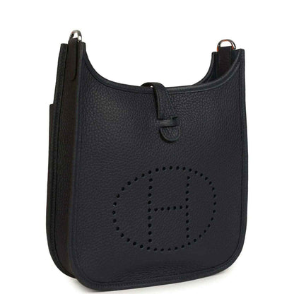 Black textured leather crossbody bag with perforated logo panel
