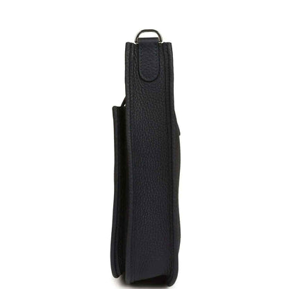 Black leather crossbody bag, vertical side view with top loop handle