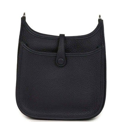 Black leather crossbody bag with front seam and central tab closure