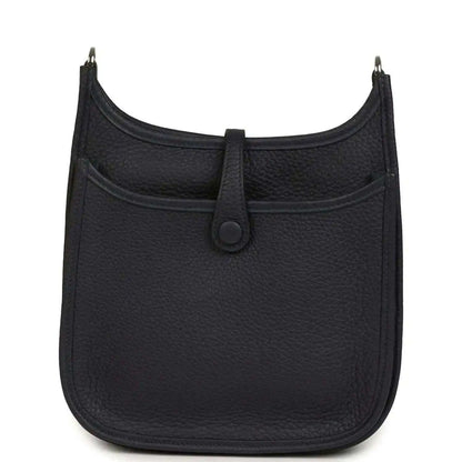 Black leather crossbody bag with front seam and central tab closure
