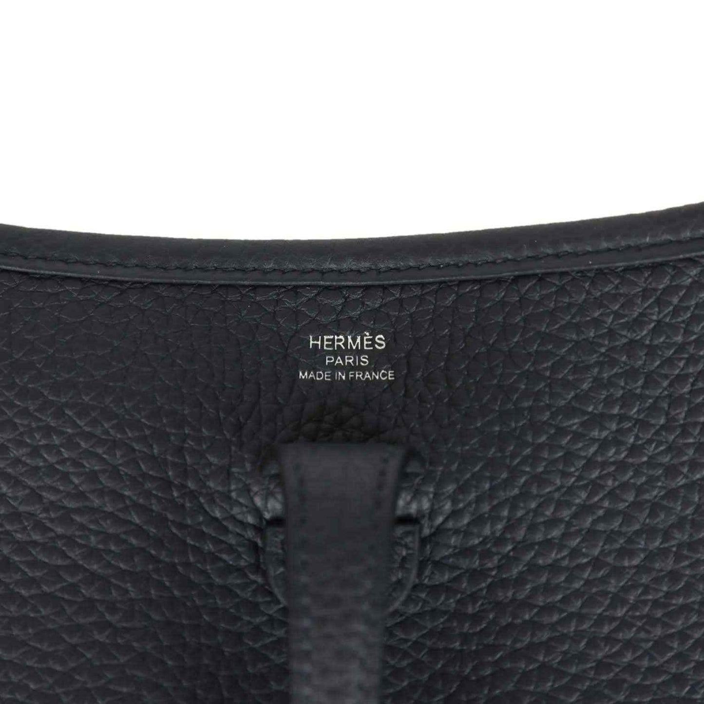 Hermes stamped black leather bag panel, embossed logo and Made in France
