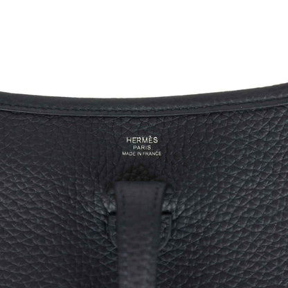 Hermes stamped black leather bag panel, embossed logo and Made in France