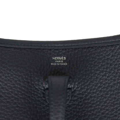 Hermes stamped black leather bag panel, embossed logo and Made in France