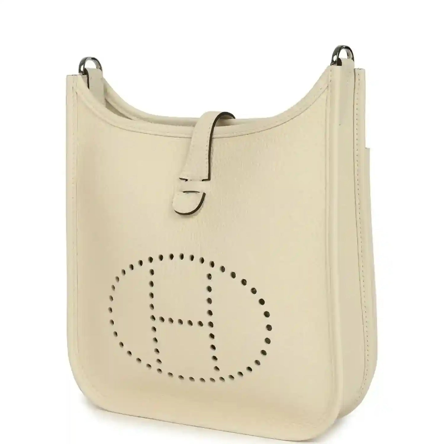 Cream leather shoulder bag with perforated logo front and top handle rings