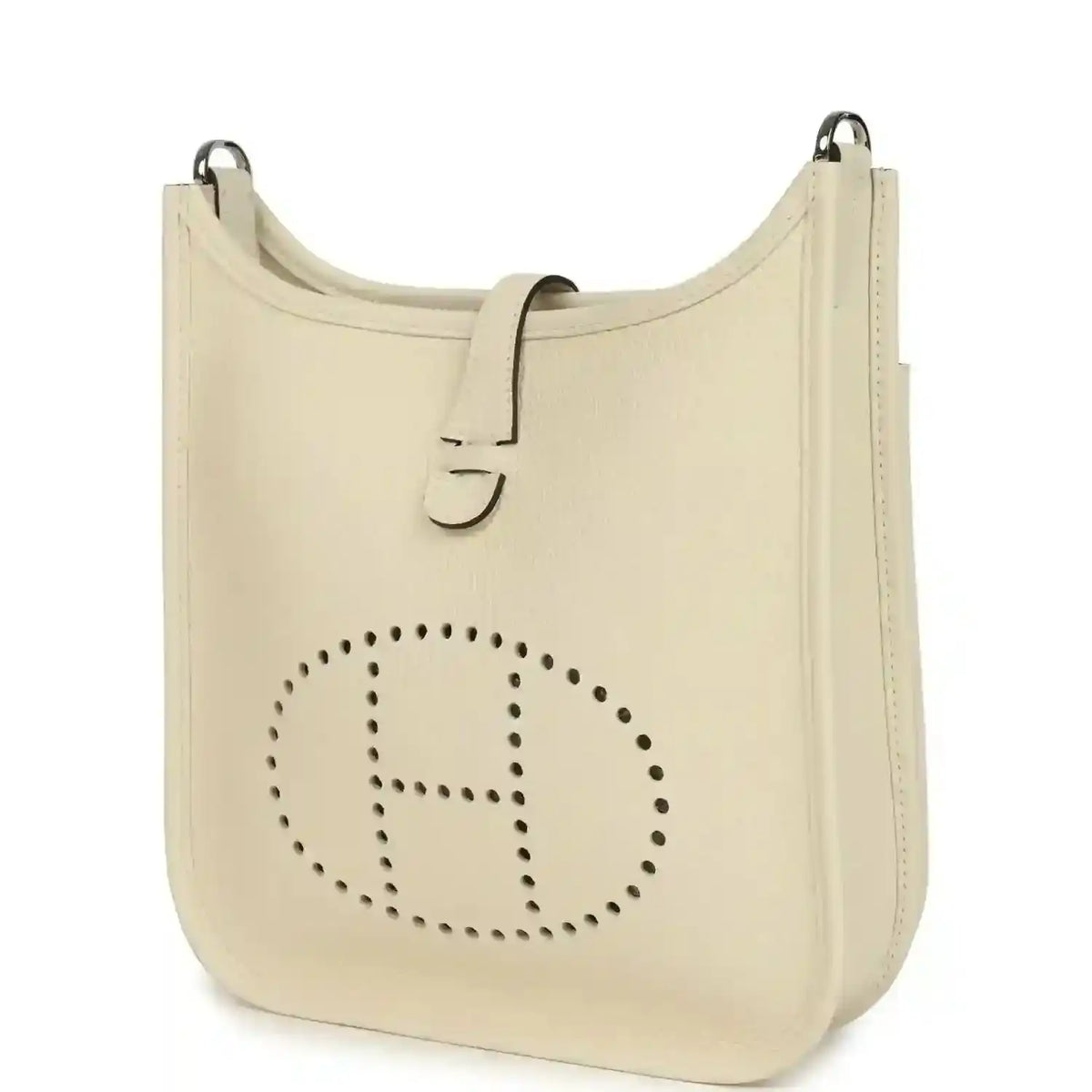 Cream leather shoulder bag with perforated logo front and top handle rings