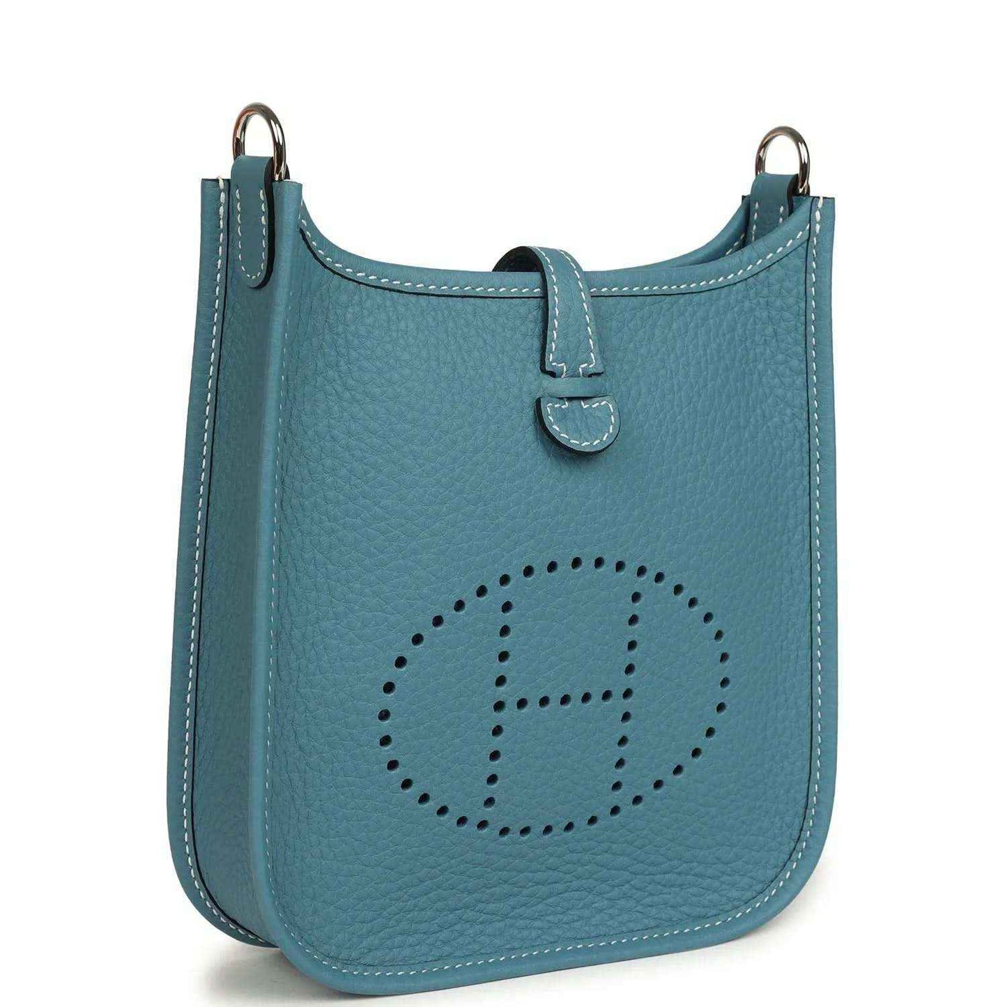 Blue denim leather mini messenger bag with perforated oval logo and top handles