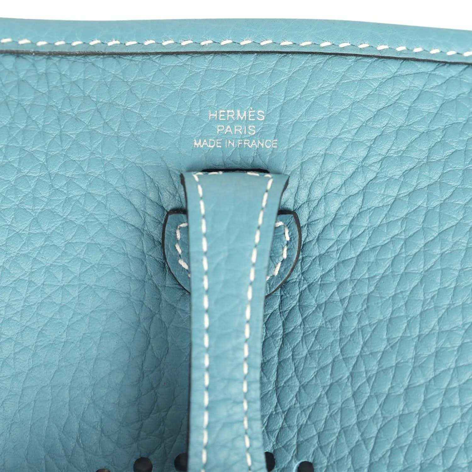 Hermès Paris made in France stamped on blue denim leather strap tab