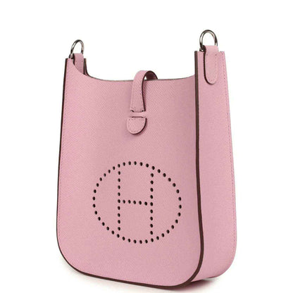 Mauve Evelyne Sellier TPM bag with front perforated logo and dual hanging straps