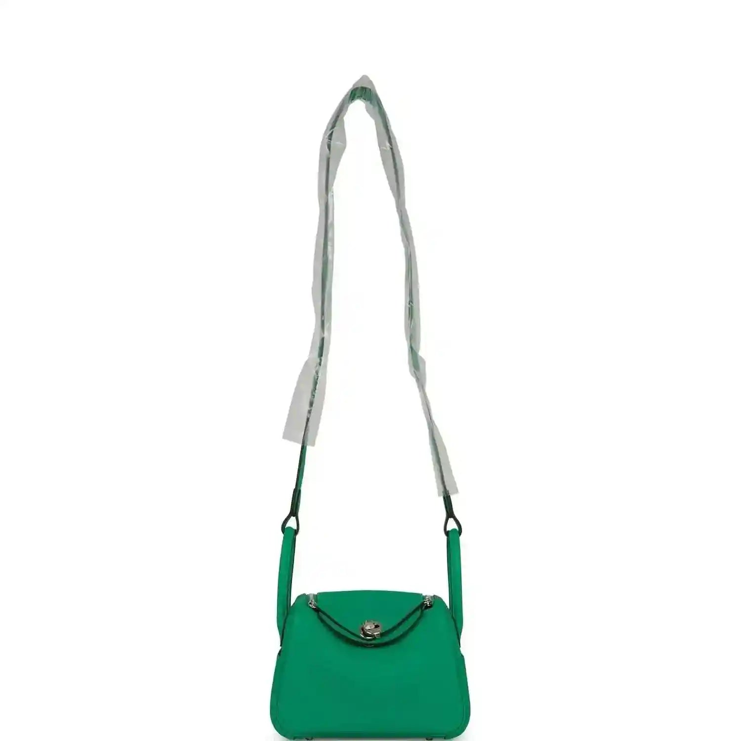 Mini green leather handbag with shoulder straps and flap front