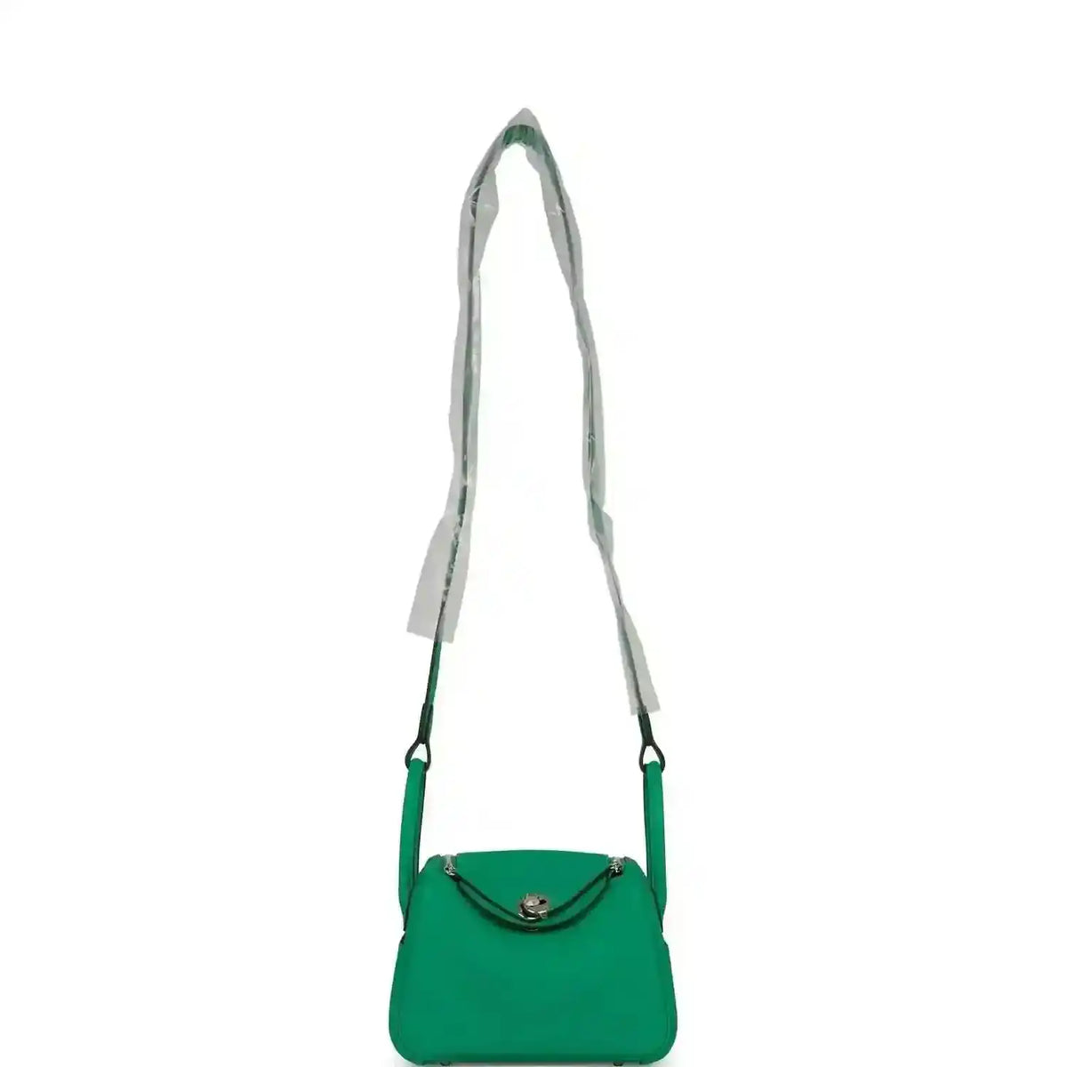 Mini green leather handbag with shoulder straps and flap front