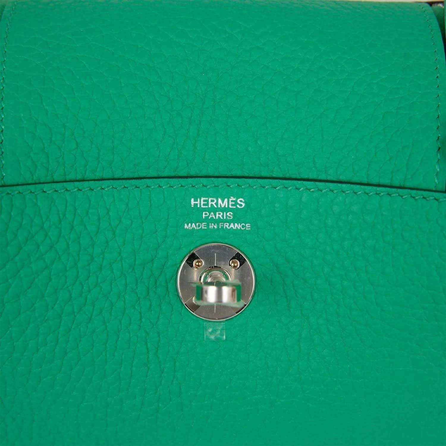 Hermes mini green leather handbag with snap hardware and logo stamp